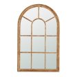 Coolum Arched Wall Mirror.  This decorative wall mirror boasts an oversized arched silhouette and a natural brown frame For Sale