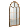 Coolum Arched Wall Mirror.  This decorative wall mirror boasts an oversized arched silhouette and a natural brown frame For Sale